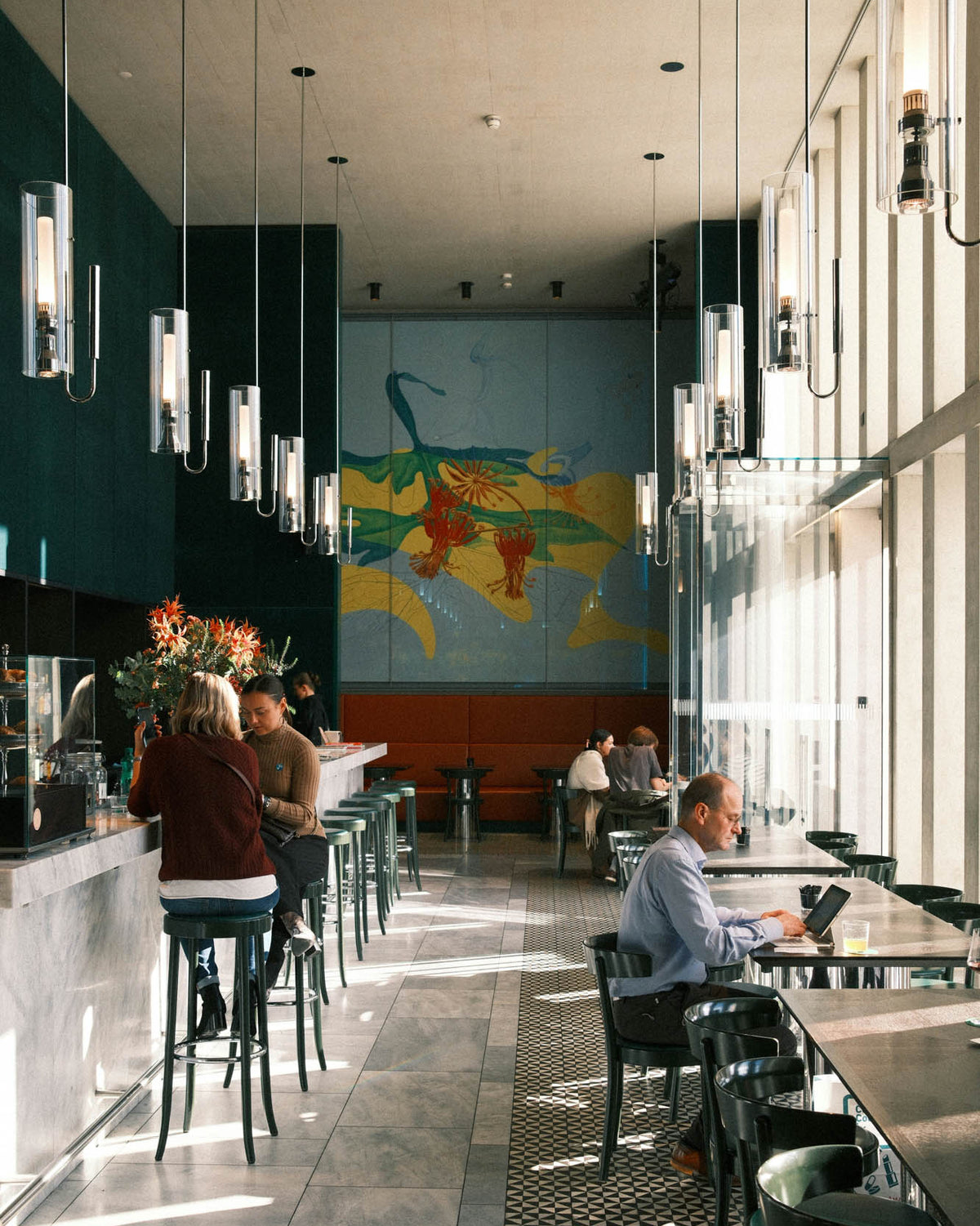 People of all ages sharing a warm, well-lit space — Mood is designed for every chapter of life